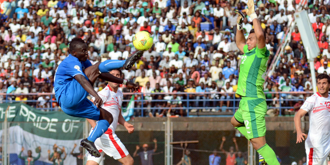Alhassan 'Crespo' Kamara, chips the keeper only to have it cleared from the line by a Tunisian defender [Leone Stars vs. Tunisia, June 2013 (Pic: Darren McKinstry)
